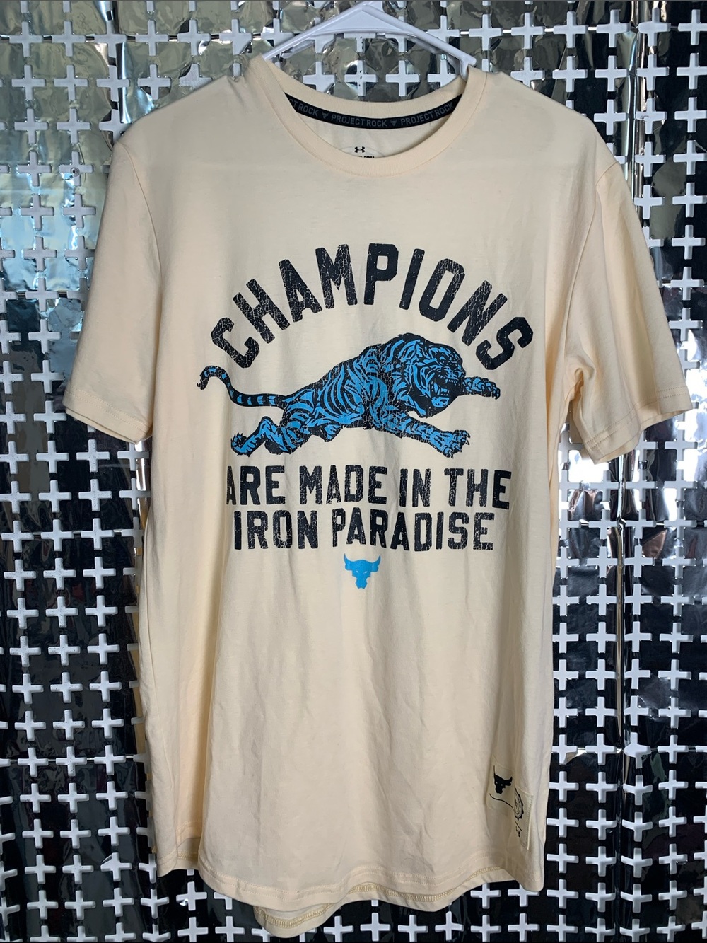 Under Armour Cream Short Sleeve Tee with Blue Tiger Graphic